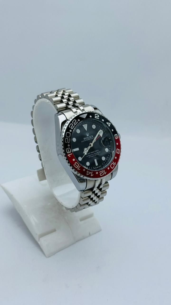Rolex Luxury Stainless Steel Sports Watch with Black Dial & Red-Black Bezel – Dual Time Style